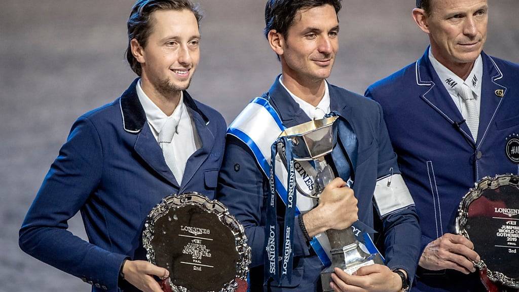 Martin Fuchs als Zweiter (links) und Steve Guerdat (Mitte) als Sieger stehen 2019 beim Weltcupfinal in Göteborg gemeinsam auf dem Podest, zusammen mit Peder Fredricson